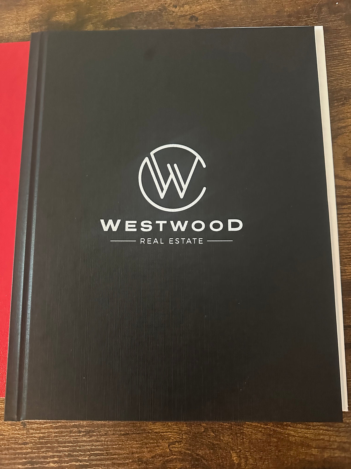 Custom black hard cover with white foil logo